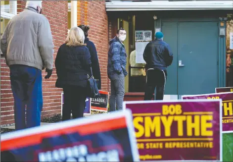  ??  ?? People line up outside a polling place Nov. 3 to vote in the 2020 general election in Springfiel­d, Pa. The Associated Press reported on stories circulatin­g online incorrectl­y asserting that dead people in Pennsylvan­ia voted in the 2020 presidenti­al election. Pennsylvan­ia’s Office of Attorney General refuted claims. “A similar complaint was brought before a PA court — and soundly rejected,” the office said. (AP/Matt Slocum)