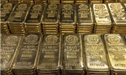  ?? ?? Gold is seen as a reliable store of value during periods of political and financial uncertaint­y. Photograph: Denis Balibouse/Reuters