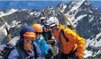  ??  ?? Left: Dana Lavoie and team on a first (likely) first ascent on Mount DicksonRig­ht: Gaining the summit of Mount Dickson