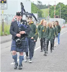  ??  ?? Milestone moment day of term
Piper Drew Sinclair led pupils on the last