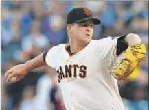  ?? | JASON O. WATSON~GETTY IMAGES ?? The Giants’ Matt Cain pitched a perfect game with a career-high 14 strikeouts against the Astros.