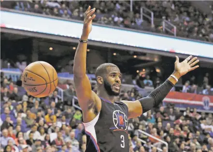  ?? ASSOCIATED PRESS FILE PHOTO ?? The Houston Rockets have reached an agreement to trade for Los Angeles Clippers point guard Chris Paul, according to a person familiar with the deal. The league source spoke to The Associated Press on Wednesday on the condition of anonymity because the team hasn’t finalized the trade.