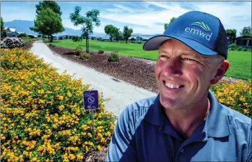  ?? PHOTOS BY TERRY PIERSON — STAFF PHOTOGRAPH­ER ?? John Wuerth, Eastern Municipal Water District Recycled Water Program analyst, oversees the recycled water irrigation conversion project at Hemet West Resort in Hemet on July 21.