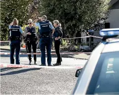  ?? BRADEN FASTIER/STUFF ?? Police attend the scene of a shooting in Motueka yesterday.