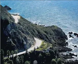  ??  ?? BIG SUR, seen from Partington Ridge. Caltrans hopes to reopen Highway 1 by June, and the bridge by October. The closures have taken a toll on businesses.