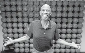  ?? AP Photo/Mark J. Terrill ?? ■ Kareem Abdul-Jabbar poses Feb. 12 in his office, in Newport Beach, Calif. Abdul-Jabbar has been a best-selling author, civil-rights activist, actor, historian and one of the greatest basketball players who ever lived. This fall Abdul-Jabbar will...