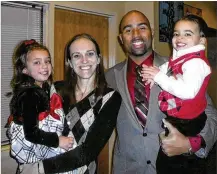  ?? CONTRIBUTE­D ?? Nick Johnson, head football coach at Earlham College, has had to take on new “Daddy duties” as his wife, Melissa, battles lifethreat­ening medical problems.