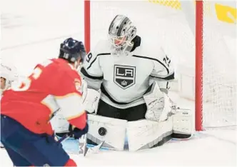  ?? WILFREDO LEE/AP ?? Panthers center Aleksander Barkov (16) attempts a shot at Kings goaltender Pheonix Copley during the second period Friday in Sunrise.