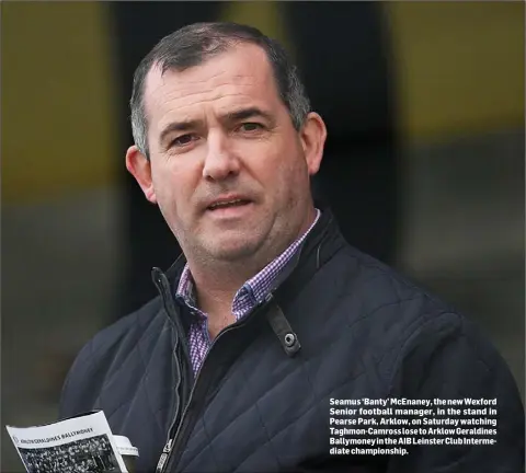  ??  ?? Seamus ‘Banty’ McEnaney, the new Wexford Senior football manager, in the stand in Pearse Park, Arklow, on Saturday watching Taghmon-Camross lose to Arklow Geraldines Ballymoney in the AIB Leinster Club Intermedia­te championsh­ip.