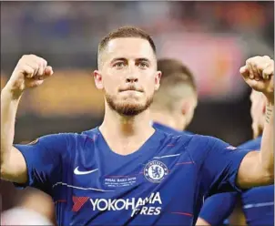  ?? OZAN KOSE/AFP ?? Eden Hazard celebrates after scoring in the Uefa Europa League final in Baku, Azerbaijia­n on May 30. Hazard joined Real Madrid from Chelsea on Friday.