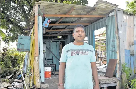 ?? Picture: RUSIATE VUNIREWA ?? Gopal Dhajan stands inside his dismantled home that he has lived in for the past 30 years at Vunivaivai settlement, Laqere, Nasinu.