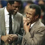  ?? MIKE KULLEN — THE ASSOCIATED PRESS FILE ?? In this Jan. 15, 1988, file photo, former Boston Celtics teammates Bill Russell, Sacramento Kings coach, left, and K.C. Jones, Celtics coach, meet before the start of the Kings-Celtics NBA basketball game at the Boston Garden in Boston.