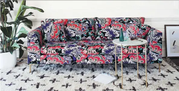  ?? ANTHROPOLO­GIE ?? Liberty of London’s Feather Bloom floral print, which graces a seating collection this season at Anthropolo­gie.