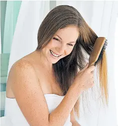 ??  ?? Brushing up: improve your hair by following a healthy, well-balanced diet