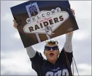  ?? JOHN LOCHER / AP ?? Labor union member Geraldine Lacy celebrates Monday in Las Vegas after NFL owners approved the move of the Raiders from Oakland by a 31-1 vote.