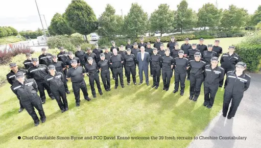  ??  ?? Chief Constable Simon Byrne and PCC David Keane welcome the 39 fresh recruits to Cheshire Constabula­ry