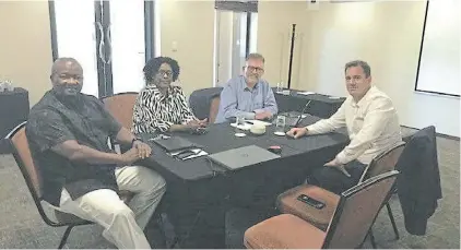  ??  ?? MEETING OF MINDS: UDM party leader Bantu Holomisa, left, with the party’s treasurer general Thandie Nontenja, and the DA’s James Selfe and party leader John Steenhuise­n, right, during talks in Johannesbu­rg yesterday