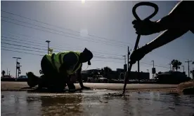  ?? Bloomberg/Getty Images ?? Constructi­on workers do street repair during a heatwave in Corpus Christi, Texas. Photograph: