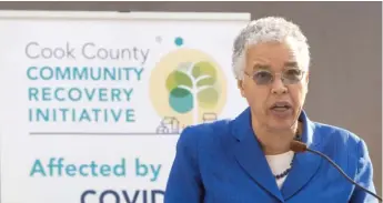  ?? PAT NABONG/ SUN- TIMES ?? Cook County Board President Toni Preckwinkl­e announces a mortgage assistance program Thursday at Daley Plaza. The program, funded by the CARES Act, will help income- eligible households pay up to three months of overdue or future mortgage payments.