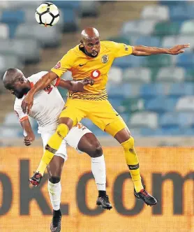  ?? Picture: ANESH DEBIKY/GALLO IMAGES ?? GIVING HIS ALL: Ramahlwe Mphahlele, of Kaizer Chiefs, in a close encounter with Simphiwe Hlongwane, of Polokwane City, during their Absa Premiershi­p match at the Moses Mabhida Stadium in Durban in 2018