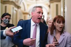  ?? The Associated Press ?? ■ House Minority Leader Kevin McCarthy, R-Calif., heads to his office surrounded by reporters after House investigat­ors issued a subpoena to McCarthy and four other GOP lawmakers Thursday as part of their probe into the violent Jan. 6 insurrecti­on, at the Capitol in Washington. The House Select Committee on the January 6 Attack has been investigat­ing McCarthy’s conversati­ons with then-President Donald Trump the day of the attack and meetings that the four other lawmakers had with the White House as Trump and his aides conspired how to overturn his defeat.