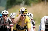  ?? — Reuters ?? Team Sky rider Geraint Thomas of Britain, wearing the overall leader’s yellow jersey, during the 17th stage.