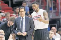  ?? WILFREDO LEE/AP ?? Heat veteran forward Udonis Haslem, right, talks with coach Erik Spoelstra during the Celtic game earlier this week.