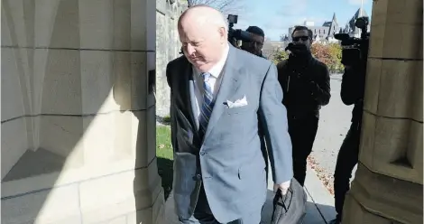  ?? Adrian Wyld/The Canadian Press/Files ?? Sen. Mike Duffy, during a Feb. 11 meeting with Harper aide Patrick Rogers, agreed to repay contested expense payouts as long as it didn’t disqualify him from representi­ng Prince Edward Island in the Senate, newly released emails show.