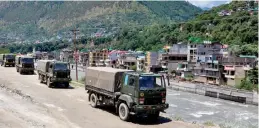  ?? — PTI ?? Army trucks move towards Ladakh in the wake of India-China border dispute in eastern Ladakh in Kullu district on Thursday.