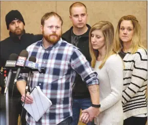  ?? The Associated Press ?? Family spokesman David Boyd and others hold a news conference Thursday in Crystal Lake, Ill., after an 18-year-old man was assaulted in Chicago earlier this week. Four people were charged with hate crimes in connection with a video broadcast live on...