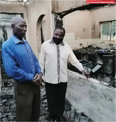  ??  ?? Pic: Community Podium via Twitter
MDC Alliance legislator for Bulawayo East Ilos Nyoni (right) stands inside one of the rooms of the Killarney house that was gutted by fire