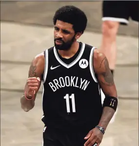  ?? Adam Hunger / Associated Press ?? Nets guard Kyrie Irving (11) reacts against the Bucks during Game 1 of their second-round playoff series in June.