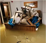  ??  ?? Damage: Half of the rooms are submerged