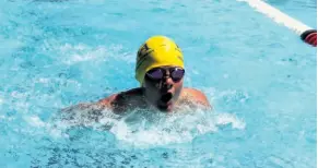  ??  ?? Pongola Swim Academy’s Renco Venter completes his 50m butterfly race in 47.44