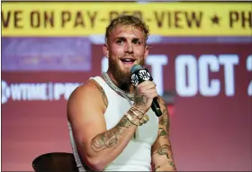  ?? AP PHOTO/ASHLEY LANDIS, FILE ?? FILE - Jake Paul speaks during a news conference Monday, Sept. 12, 2022, in Los Angeles. Jake Paul’s unorthodox career in boxing might just be about to get serious. The YouTube megastar influencer-turned-prizefight­er will be coming up against a recognized profession­al boxer for the first time Sunday when he takes on Tommy Fury.