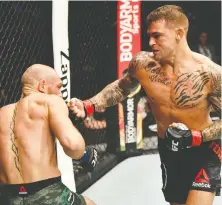  ?? JEFF BOTTARI/GETTY IMAGES ?? Conor McGregor was pummelled by Dustin Poirier at UFC 257 Saturday at Etihad Arena in Abu Dhabi.