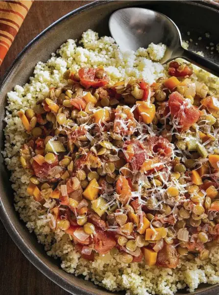  ?? Tammy Ljungblad / Kansas City Star ?? Hot, cooked brown rice or quinoa can substitute for the couscous in this vegeterian dish.