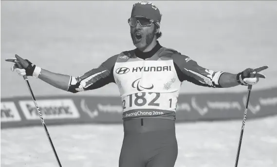  ?? THOMAS LOVELOCK/OIS/IOC/THE ASSOCIATED PRESS ?? Canada’s Brian McKeever celebrates his win in the 1.5-kilometre cross-country skiing sprint classic in Pyeongchan­g on Wednesday.