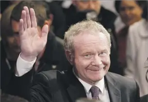  ?? Peter Morrison Associated Press ?? FROM REBEL TO POLITICIAN As a young man, Martin McGuinness was known as a ruthless Irish Republican Party commander. But he later turned to diplomacy. “My war is over,” he said in 2008.