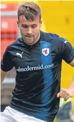  ??  ?? Jason Thomson, left, fired home Rovers’ winning goal after on-form Lewis Vaughan had opened the scoring.