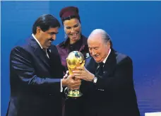  ?? AFP ?? Sheikh Hamad bin Khalifa Al Thani, emir of Qatar when the World Cup was awarded, with his wife, Sheikha Moza bint Nasser Al Missned, and Fifa’s Sepp Blatter in December 2010