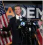  ?? RICH PEDRONCELL­I THE ASSOCIATED PRESS ?? Gov. Gavin Newsom addresses reporters after beating back the recall attempt that aimed to remove him from office in Sacramento in 2021.