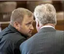  ?? Alexandra Wimley/Post-Gazette ?? Jeriah Mast, left, speaks with his attorney, John E. Johnson Jr., during a pretrial hearing Aug. 29 in Millersbur­g, Ohio.