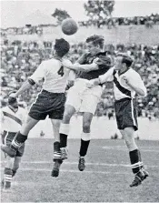  ??  ?? England midfielder Tom Finney (above, centre) tries to head the ball between US defenders Walter Bahr (also pictured, above right) and Charlie Colombo