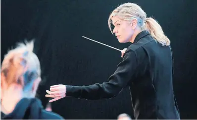  ?? COURTESY CANADIAN OPERA COMPANY ?? “I have no idea why people ask what it means to be a woman conductor,” Keri-Lynn Wilson says. “I just do what I do.”