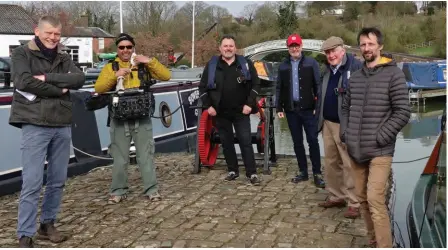  ?? PHOTO SUPPLIED ?? Countryfil­e presenter Tom Heap, left, with his film crew and, behind centre, Phil Abbott of Wharf House Narrowboat­s, Paul Rogers of
IWA and Tim Coghlan, Braunston Marina.