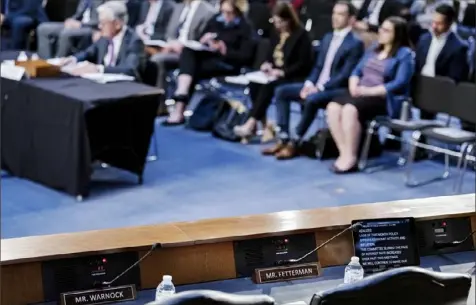  ?? Haiyun Jiang/The New York Times ?? The empty space of U.S. Sen. John Fetterman during the Senate Banking, Housing, and Urban Affairs Committee hearing on March 6. There are downsides to Mr. Fetternan not being present. He missed hearing the Norfolk Southern CEO’s testimony on Thursday before another Senate committee on the East Palestine, Ohio, train derailment.