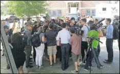  ?? JENNIFER BRETT / JBRETT@AJC.COM ?? In the center of this media scrum was a frightened young woman desperate for answers. Her brother had been in the Pulse nightclub in Orlando the night a gunman opened fire, leaving 49 dead.