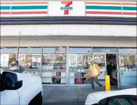  ?? Luis Sinco Los Angeles Times ?? FEDERAL IMMIGRATIO­N AGENTS targeted about 100 7-Eleven stores across the nation for audits and inspection­s, including this one on Beverly Boulevard.