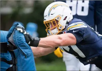  ?? AP PhoTo/KYUsUng gong ?? Los Angeles Chargers defensive end Joey Bosa during an NFL football training camp in Costa Mesa, Calif., on Monday.